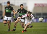 24 February 2018; Brain Cassidy of Slaughtneil is tackled by Alan Cronin of Nemo Rangers during the AIB GAA Football All-Ireland Senior Club Championship Semi-Final match between Nemo Rangers and Slaughtneil at O'Moore Park in Portlaoise, Co Laois. Photo by Eóin Noonan/Sportsfile