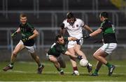 24 February 2018; Se McGuigan of Slaughtneil has his shot on goal blocked by Alan Cronin of Nemo Rangers during the AIB GAA Football All-Ireland Senior Club Championship Semi-Final match between Nemo Rangers and Slaughtneil at O'Moore Park in Portlaoise, Co Laois. Photo by Eóin Noonan/Sportsfile