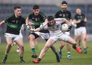 24 February 2018; Brain Cassidy of Slaughtneil in action against Colin O’Brien of Nemo Rangers during the AIB GAA Football All-Ireland Senior Club Championship Semi-Final match between Nemo Rangers and Slaughtneil at O'Moore Park in Portlaoise, Co Laois. Photo by Eóin Noonan/Sportsfile