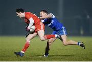 24 February 2018; Lee Brennan of Tyrone  in action against Ryan Wylie of Monaghan during the Allianz Football League Division 1 Round 4 match between Monaghan and Tyrone at St Mary's Park in Castleblayney, Monaghan. Photo by Oliver McVeigh/Sportsfile