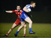 24 February 2018; Colin Walshe of Monaghan in action against Kieran McGeary of Tyrone during the Allianz Football League Division 1 Round 4 match between Monaghan and Tyrone at St Mary's Park in Castleblayney, Monaghan. Photo by Oliver McVeigh/Sportsfile
