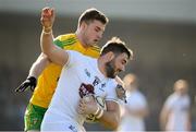 25 February 2018; Fergal Conway of Kildare in action against Tony McClenaghan of Donegal during the Allianz Football League Division 1 Round 4 match between Donegal and Kildare at Fr Tierney Park in Ballyshannon, Co Donegal. Photo by Stephen McCarthy/Sportsfile
