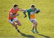 25 February 2018; Cian Donohue of Offaly in action against Niall Grimley of Armagh during the Allianz Football League Division 3 Round 4 match between Offaly and Armagh at Bord Na Móna O’Connor Park in Offaly. Photo by Sam Barnes/Sportsfile