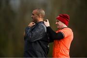 26 February 2018; Simon Zebo gets assistance with his GPS device from Rory Scannell prior to Munster Rugby squad training at the University of Limerick in Limerick. Photo by Diarmuid Greene/Sportsfile