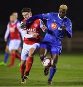 26 February 2018; Dean Clarke of St Patrick's Athletic in action against Ismahil Akinade of Waterford during the SSE Airtricity League Premier Division match between Waterford and St Patrick's Athletic at the RSC in Waterford. Photo by Harry Murphy/Sportsfile