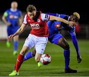 26 February 2018; Simon Madden of St Patrick's Athletic in action against Ismahil Akinade of Waterford during the SSE Airtricity League Premier Division match between Waterford and St Patrick's Athletic at the RSC in Waterford. Photo by Harry Murpy/Sportsfile.