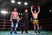 3 March 2018; Victor Rabei is announced victorious against Mark Morris in their lightweight bout at the National Stadium in Dublin. Photo by Ramsey Cardy/Sportsfile