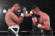 3 March 2018; Cillian Reardon, right, in action against Richard Hegyi during their middleweight bout at the National Stadium in Dublin. Photo by Ramsey Cardy/Sportsfile