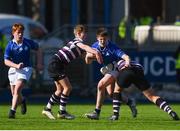 7 March 2018; Adam Mulvihill of St Mary's College is tackled by Mattie Lynch, left, and Adam Hall of Terenure College during the Bank of Ireland Leinster Schools Junior Cup Round 2 match between St. Mary's College and Terenure College at Donnybrook Stadium in Dublin. Photo by Daire Brennan/Sportsfile