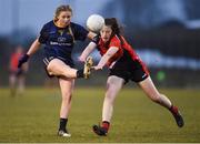 9 March 2018; Tess Murtagh of DCU is blocked down by Eva Gilmore of RCSI during the Gourmet Food Parlour HEC Donaghy Cup Final match between RCSI and DCU at IT Blanchardstown in Blanchardstown, Dublin. Photo by Piaras Ó Mídheach/Sportsfile