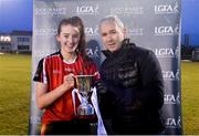 9 March 2018; RCSI captain Eva Gilmore is presented with the cup by Donal Barry from the Ladies HEC after the Gourmet Food Parlour HEC Donaghy Cup Final match between RCSI and DCU at IT Blanchardstown in Blanchardstown, Dublin. Photo by Piaras Ó Mídheach/Sportsfile