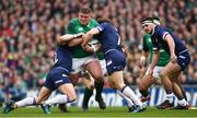 10 March 2018; Tadhg Furlong of Ireland is tackled by Pete Horne, left, and Hamish Watson of Scotland during the NatWest Six Nations Rugby Championship match between Ireland and Scotland at the Aviva Stadium in Dublin. Photo by Ramsey Cardy/Sportsfile