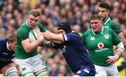 10 March 2018; Dan Leavy of Ireland is tackled by Gordon Reid of Scotland during the NatWest Six Nations Rugby Championship match between Ireland and Scotland at the Aviva Stadium in Dublin. Photo by Ramsey Cardy/Sportsfile