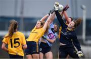 10 March 2018; Karen McGrath of UCD competes a high ball against DCU players, from left, Katie Murray, Deirdre Geaney and Emer Ní Eafa during the Gourmet Food Parlour HEC O'Connor Cup semi-final match between Dublin City University and University College Dublin at IT Blanchardstown in Blanchardstown, Dublin. Photo by David Fitzgerald/Sportsfile