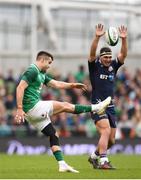 10 March 2018; Conor Murray of Ireland kicks ahead of Stuart McInally of Scotland during the NatWest Six Nations Rugby Championship match between Ireland and Scotland at the Aviva Stadium in Dublin. Photo by Stephen McCarthy/Sportsfile