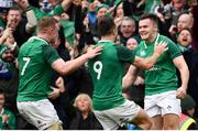 10 March 2018; Jacob Stockdale of Ireland celebrates with Conor Murray, 9, and Dan Leavy, 7, after scoring his side's second try during the NatWest Six Nations Rugby Championship match between Ireland and Scotland at the Aviva Stadium in Dublin. Photo by Ramsey Cardy/Sportsfile
