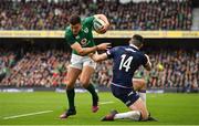 10 March 2018; Jacob Stockdale of Ireland steps inside Blair Kinghorn of Scotland on the way to scoring his and his side's second try during the NatWest Six Nations Rugby Championship match between Ireland and Scotland at the Aviva Stadium in Dublin. Photo by Brendan Moran/Sportsfile