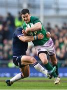 10 March 2018; Jonathan Sexton of Ireland is tackled by Pete Horne of Scotland during the NatWest Six Nations Rugby Championship match between Ireland and Scotland at the Aviva Stadium in Dublin. Photo by Ramsey Cardy/Sportsfile