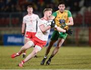 10 March 2018; Hugh Pat McGeary of Tyrone in action against Odhran MacNiallais of Donegal during the Allianz Football League Division 1 Round 5 match between Tyrone and Donegal at Healy Park in Omagh, Co Tyrone. Photo by Oliver McVeigh/Sportsfile