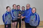 10 March 2018; Eleanor Godden of Loreto Kilkenny and team-mates are presented with the junior girls cup by vice president of the Irish Schools, Fr Ailbe, after the junior girls 2500m during the Irish Life Health All Ireland Schools Cross Country at Waterford IT in Waterford. Photo by Matt Browne/Sportsfile