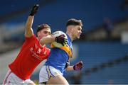 11 March 2018; Michael Quinlivan of Tipperary in action against Derek Maguire of Louth during the Allianz Football League Division 2 Round 5 match between Tipperary and Louth at Semple Stadium in Thurles, Co Tipperary. Photo by Sam Barnes/Sportsfile