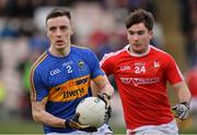 11 March 2018; Alan Campbell of Tipperary in action against Ross Nally of Louth during the Allianz Football League Division 2 Round 5 match between Tipperary and Louth at Semple Stadium in Thurles, Co Tipperary. Photo by Sam Barnes/Sportsfile