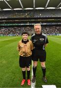 11 March 2018: Allianz Dublin Primary Whistler Seán Hain, St. Paul’s NS, Navan, with referee Ciaran Branagan prior to the Allianz Football League Division 1 Round 5 match between Dublin and Kerry at Croke Park in Dublin. Photo by Stephen McCarthy/Sportsfile