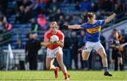11 March 2018; Conor Grimes of Louth in action against Emmet Moloney of Tipperary during the Allianz Football League Division 2 Round 5 match between Tipperary and Louth at Semple Stadium in Thurles, Co Tipperary. Photo by Sam Barnes/Sportsfile