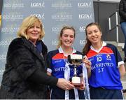 11 March 2018; LGFA president Marie Hickey presenting the cup to WIT joint captains Aine Byrne, left and Mairead Daly after the Gourmet Food Parlour HEC Giles Cup Final match between DCU and WIT at the GAA National Games Development Centre in Abbotstown, Dublin. Photo by Eóin Noonan/Sportsfile