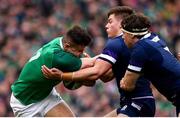 10 March 2018; Jacob Stockdale of Ireland is tackled by Huw Jones, left, and Hamish Watson of Scotland during the NatWest Six Nations Rugby Championship match between Ireland and Scotland at the Aviva Stadium in Dublin. Photo by Ramsey Cardy/Sportsfile