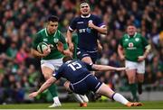 10 March 2018; Conor Murray of Ireland is tackled by Stuart Hogg of Scotland during the NatWest Six Nations Rugby Championship match between Ireland and Scotland at the Aviva Stadium in Dublin. Photo by Ramsey Cardy/Sportsfile
