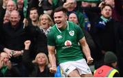 10 March 2018: Jacob Stockdale of Ireland celebrates after scoring his side's first try during the NatWest Six Nations Rugby Championship match between Ireland and Scotland at the Aviva Stadium in Dublin. Photo by Ramsey Cardy/Sportsfile