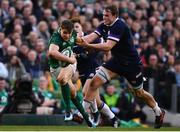 10 March 2018: Garry Ringrose of Ireland is tackled by Jonny Gray of Scotland during the NatWest Six Nations Rugby Championship match between Ireland and Scotland at the Aviva Stadium in Dublin. Photo by Ramsey Cardy/Sportsfile