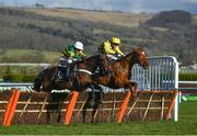 13 March 2018; Buveur D'air, left, with Barry Geraghty up, jumps the last alongside Melon, with Paul Townend up, who finished second, on their way to winning The UniBet Champion Hurdle Challenge Trophy during Day One of the Cheltenham Racing Festival at Prestbury Park in Cheltenham, England. Photo by Ramsey Cardy/Sportsfile