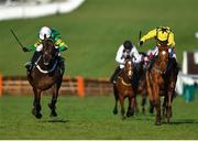 13 March 2018; Buveur D'Air, left, with Barry Geraghty up, races alongside Melon, right, with Paul Townend up, on their way to winning the UniBet Champion Hurdle Challenge Trophy on Day One of the Cheltenham Racing Festival at Prestbury Park in Cheltenham, England. Photo by Seb Daly/Sportsfile