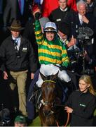 13 March 2018; Barry Geraghty celebrates as he enters the winners' enclosure after winning the UniBet Champion Hurdle Challenge Trophy with Buveur D'Air on Day One of the Cheltenham Racing Festival at Prestbury Park in Cheltenham, England. Photo by Seb Daly/Sportsfile