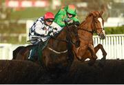 13 March 2018; Rathvinden, left, with Patrick Mullins up, leads Ms Parfois, with William Biddick up, on their way to winning the National Hunt Steeple Chase Challenge Cup on Day One of the Cheltenham Racing Festival at Prestbury Park in Cheltenham, England. Photo by Ramsey Cardy/Sportsfile