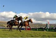 13 March 2018; Buveur D'Air, left, with Barry Geraghty up, crosses the finish post alongside Melon, right, with Paul Townend up, on their way to winning the UniBet Champion Hurdle Challenge Trophy on Day One of the Cheltenham Racing Festival at Prestbury Park in Cheltenham, England. Photo by Seb Daly/Sportsfile