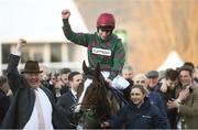 13 March 2018; Jockey Brian Hughes celebrates in the Winners Enclosure after winning the Close Brothers Novices' Handicap Chase on Mister Whitaker on Day One of the Cheltenham Racing Festival at Prestbury Park in Cheltenham, England. Photo by Ramsey Cardy/Sportsfile