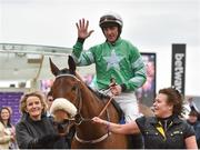 14 March 2018; Jockey Davy Russell acknowledges the crowd after winning the RSA Steeple Chase on Presenting Percy on Day Two of the Cheltenham Racing Festival at Prestbury Park in Cheltenham, England. Photo by Seb Daly/Sportsfile