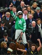 14 March 2018; Jockey Davy Russell celebrates winning the RSA Steeple Chase on Presenting Percy on Day Two of the Cheltenham Racing Festival at Prestbury Park in Cheltenham, England. Photo by Ramsey Cardy/Sportsfile