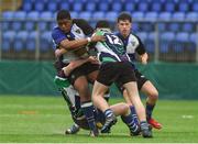 14 March 2018: David Nwambu of Dundalk Grammar School is tackled by Shane Stokes and Greg Bolger of Gorey Community School during the McMullan Cup Final match between Gorey Community School and Dundalk Grammar at Donnybrook Stadium in Dublin. Photo by Matt Browne/Sportsfile