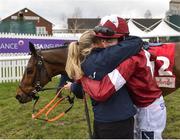 14 March 2018; Jockey Keith Donoghue celebrates with groom Lousie McGee after winning the Glenfarclas Steeple Chase on Tiger Roll on Day Two of the Cheltenham Racing Festival at Prestbury Park in Cheltenham, England. Photo by Seb Daly/Sportsfile