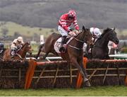 14 March 2018; Veneer Of Charm, with Jack Kennedy up, jumps the last on their way to winning the Boodles Fred Winter Juvenile Handicap Hurdle on Day Two of the Cheltenham Racing Festival at Prestbury Park in Cheltenham, England. Photo by Seb Daly/Sportsfile