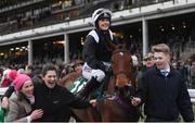 14 March 2018; Jockey Katie Walsh celebrates after winning the Weatherbys Champion Bumper on Relegate on Day Two of the Cheltenham Racing Festival at Prestbury Park in Cheltenham, England. Photo by Ramsey Cardy/Sportsfile