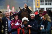 15 March 2018; Jockey Jack Kennedy with Michael O'Leary, left, along with stablehand Camilla Sharples and Eddie O'Leary, and other winning connections after winning the JLT Novices’ Chase on Shattered Love on Day Three of the Cheltenham Racing Festival at Prestbury Park in Cheltenham, England. Photo by Ramsey Cardy/Sportsfile