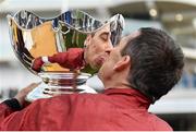 15 March 2018; Jockey Davy Russell lifts the cup after winning the Ryanair Steeple Chase with Balko Des Flos on Day Three of the Cheltenham Racing Festival at Prestbury Park in Cheltenham, England. Photo by Ramsey Cardy/Sportsfile