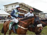 15 March 2018; Jockey Noel McParlan, left, is congratulated by Katie Walsh after winning the Fulke Walwyn Kim Muir Challenge Cup Handicap Steeple Chase on Missed Approach on Day Three of the Cheltenham Racing Festival at Prestbury Park in Cheltenham, England. Photo by Seb Daly/Sportsfile