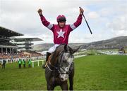 16 March 2018; Jockey Jack Kennedy celebrates after winning the JCB Triumph Hurdle on Farclas during Day Four of the Cheltenham Racing Festival at Prestbury Park in Cheltenham, England. Photo by Ramsey Cardy/Sportsfile
