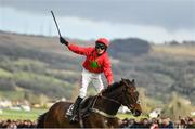 16 March 2018; Jockey Harry Cobden celebrates after winning the Albert Bartlett Novices’ Hurdle Race on Kilbricken Storm during Day Four of the Cheltenham Racing Festival at Prestbury Park in Cheltenham, England. Photo by Ramsey Cardy/Sportsfile